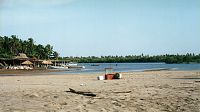 Enramada restaurants fronting the lagoon at Barra de Potos&iacute;, Guerrero, Mexico