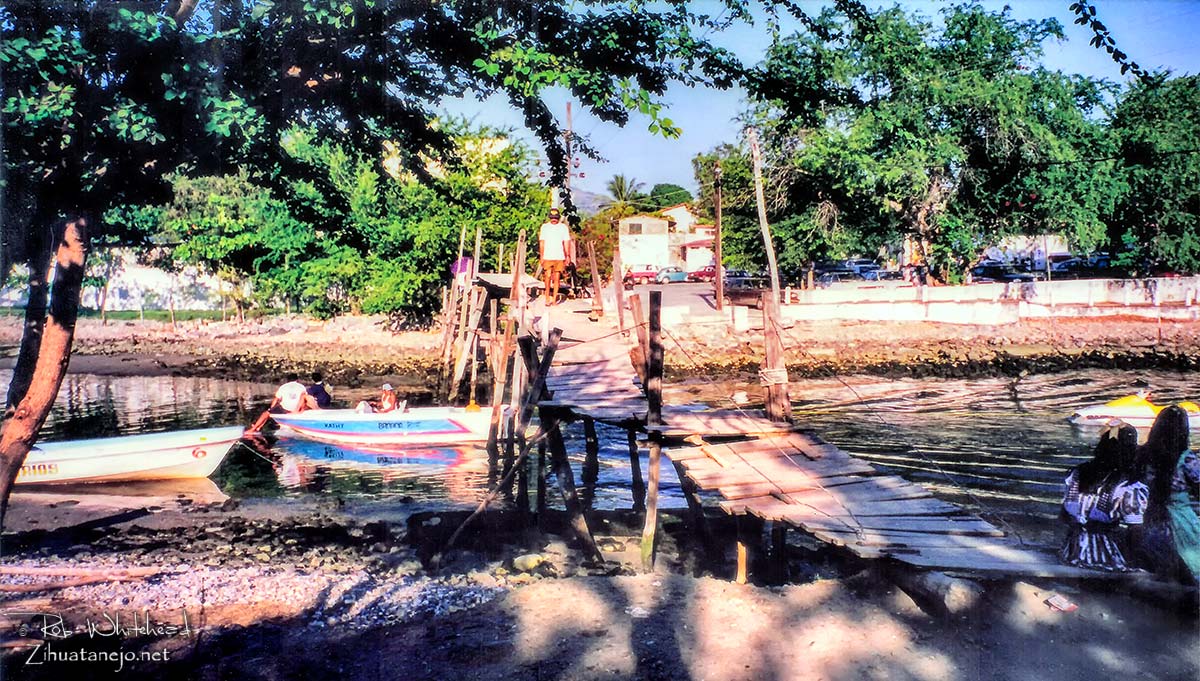 Old pedestrian bridge to El Almac&eacute;n in Zihuatanejo, Mexico